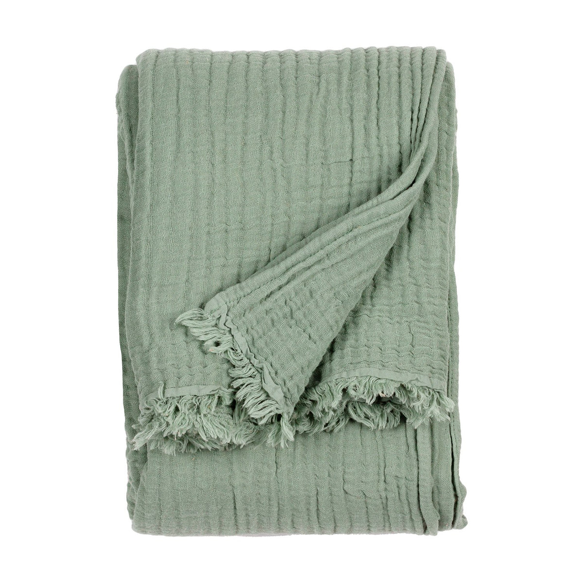 Lark Plain Cotton Throw in eucalyptus green, folded to show its crinkled cotton muslin texture and frayed edge, on a plain white background.