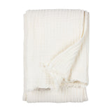 Lark Plain Cotton Throw in white, folded to show a crinkled muslin texture and frayed edge detail, on a plain white background.