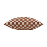 Larro Jacquard Chenille Cushion in Copper, shown side-on to reveal its plump insert, with a woven checkerboard pattern in rust-brown and oatmeal, set against a plain white background.