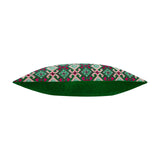 Side view of the Laurel Velvet Cotton Cushion in Cerise/Jade, a bolster cushion with a green velvet back and a folk-inspired geometric pattern in cream, green and cerise on the front.