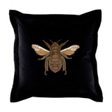 Layla Animal Velvet Cushion in black with an embroidered gold and amber bee at the centre, square Oxford-edge border, shown on a plain white background.