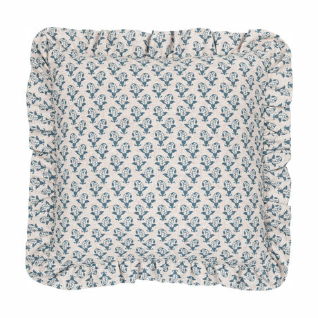 Lulah Block Floral Linen Cushion, a 45 x 45cm square cushion with a blue leaf-and-bud print on natural oatmeal linen fabric, finished with a gathered ruffle edge, on a plain white background.