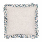 Lulah square cushion with plain natural linen centre and gathered ruffle edge in blue block floral print, shown on a white background.