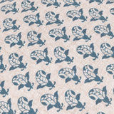 Lulah Block Floral Linen Cushion in blue, close-up of the repeating leaf-and-bud print on natural oatmeal linen-blend fabric.