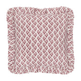 Lulah square cushion in natural linen with a red block-print floral motif and a gathered ruffle trim edge, shown on a plain white background.