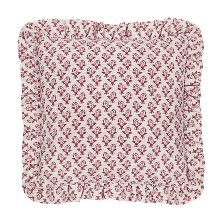 Lulah square cushion in natural linen with a red block-print floral motif and a gathered ruffle trim edge, shown on a plain white background.