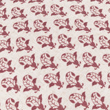 Lulah Block Floral Linen Cushion in red, close-up of repeating leaf-shaped block-print motif on natural linen-blend fabric.