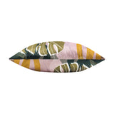 Rectangular polyester cushion shown edge-on with tropical leaf print in blush pink, amber and olive green tones, on a plain white background.
