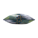 Side view of the Leafy Reversible Polyester Cushion in teal, showing tropical palm fronds, mint leaf outlines, pale shapes and amber dot print on a plain white background.