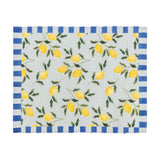 Rectangular woven polyester placemat with a lemon and leaf print on a pale ground, bordered on two sides by a blue and white striped edge, shown on a white background.