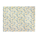 Lemons Printed Polyester Throw in blue, a rectangular fleece throw with an all-over lemon and leaf print on a pale blue ground, shown flat against a plain white background.