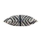 Leopardis Reversible Polyester Cushion in Multicolour, shown edge-on with a black zebra-stripe print on a woven cream ground, against a plain white background.
