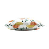 Side view of the Les Fruits Abstract Polyester Cushion, showing its plump square shape printed with watercolour lemons, oranges and green leaves on white, set against a plain background.