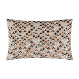 Lexington rectangular bolster cushion in jacquard velvet with a raised diamond pattern in ginger, rust, charcoal and grey on a natural base, shown on a white background.