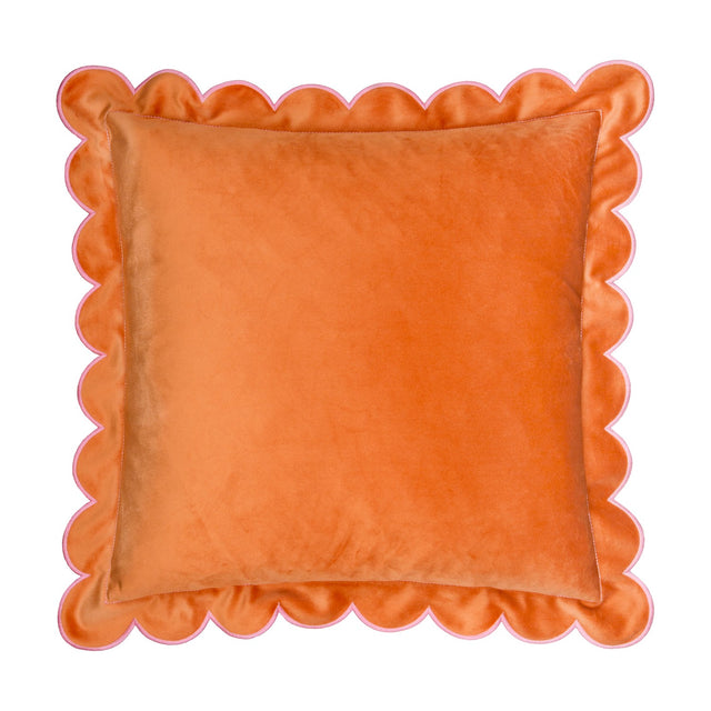Lil Scallop square velvet cushion in orange with a scalloped pink-stitched edge, shown on a plain white background.