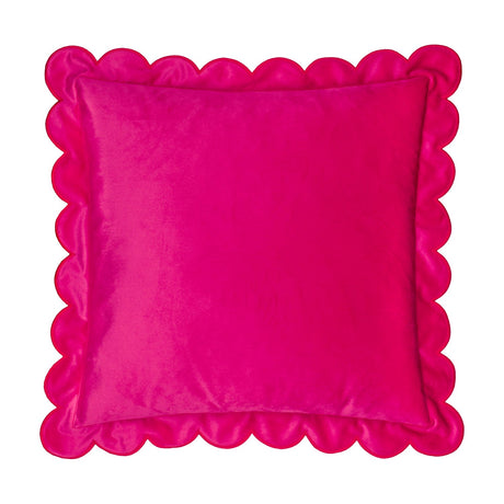 Square pink velvet cushion with a scalloped edge trimmed in contrasting red thread, plain colour block design, shown on a white background.