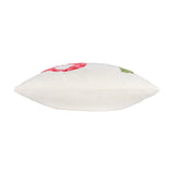 Side view of the Love Tuft Embroidered Polyester Cushion in cream micro boucle fabric with a tufted profile and red, pink, and green lettering along the edge, on a plain white background.