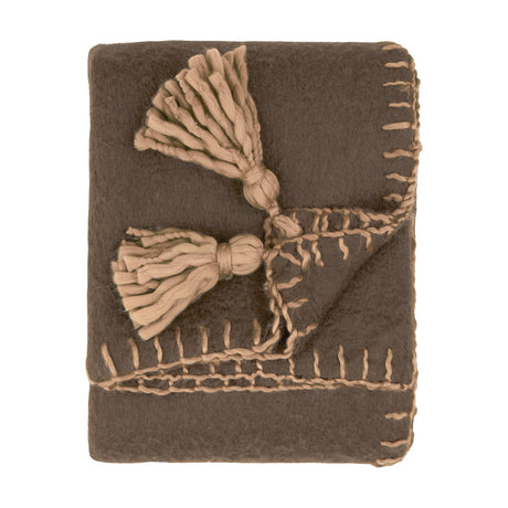 Lowen Wool Plain Polyester Throw in chocolate brown, folded with blanket-stitched edges and two tasselled corner ties, shown on a plain white background.