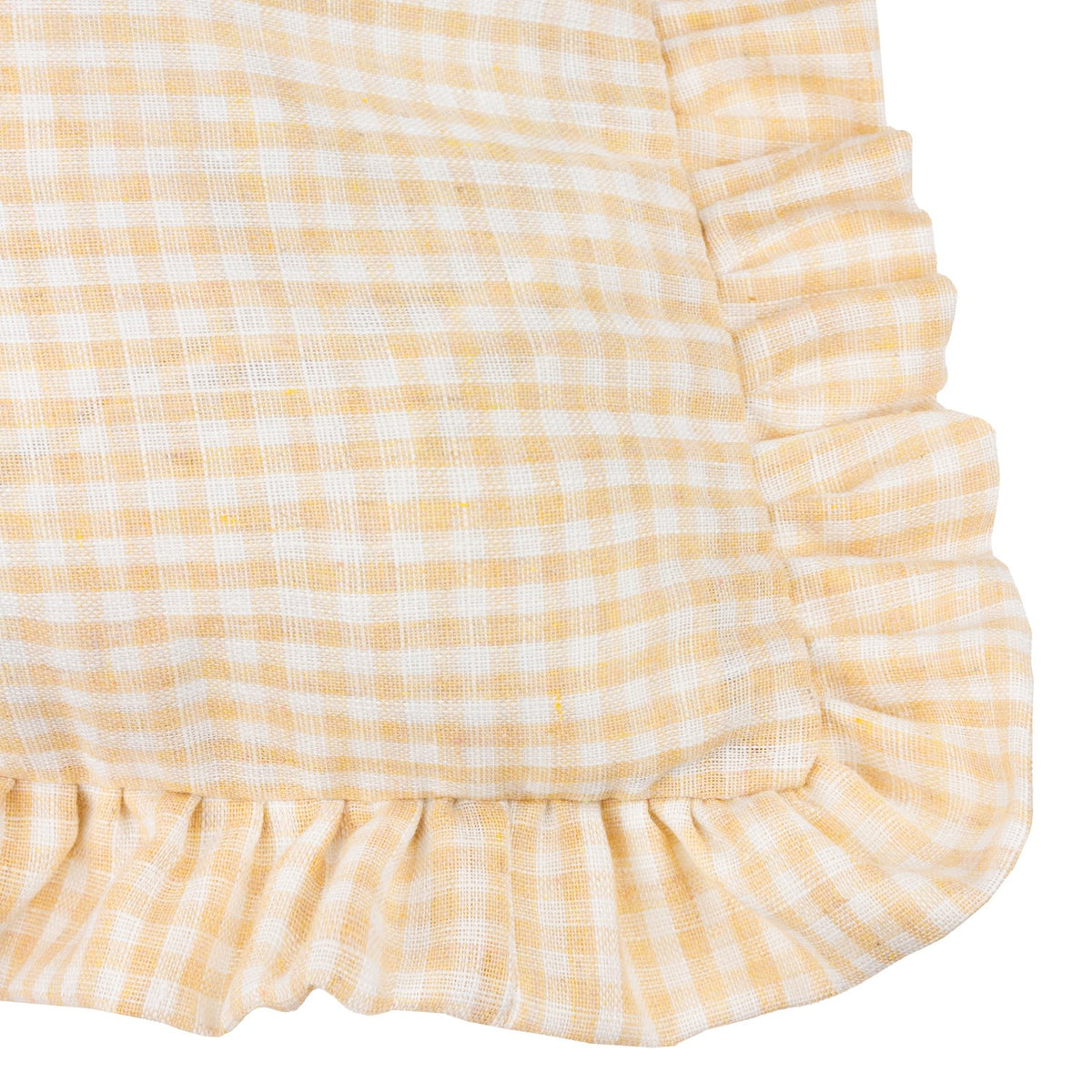 Close-up of the Les Petite Fleurs Gingham Cotton Cushion corner in natural, showing yellow-white check cotton fabric with a gathered frilled edge trim.