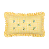 Rectangular cushion in yellow and white gingham cotton with a frilled edge trim, featuring scattered embroidered blue flower sprigs on green stems, shown on a plain white background.