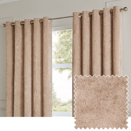 Lustre Velvet Plain Fully Lined Eyelet Curtains in oyster, shown as a pair of long panels with silver eyelet rings on a metal pole, hung in a room beside a window with a view of trees.