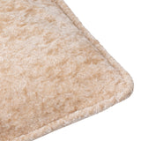 Close-up of the Lustre Velvet Plain Polyester Cushion in oyster, showing the crushed velvet pile and self-piped corner edge on a white background.