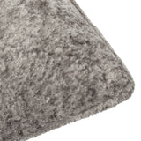 Close-up of the Lustre Velvet Plain Polyester Cushion in pewter, showing crushed velvet texture with light and dark grey tonal variation and a stitched corner edge.