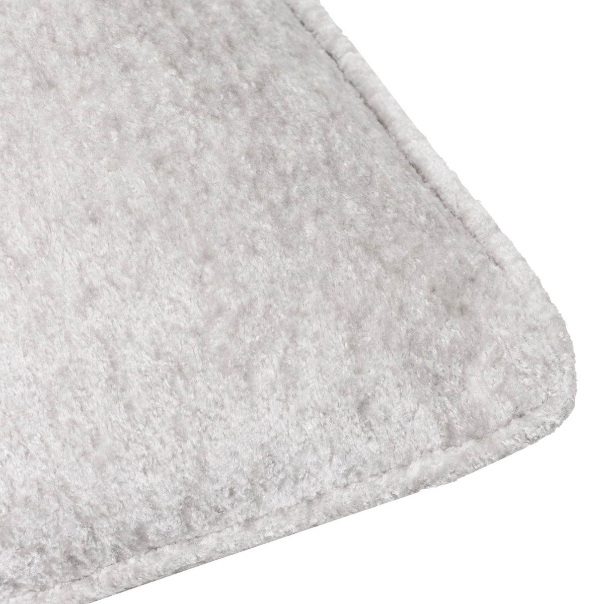 Close-up of the Lustre Velvet Plain Polyester Cushion in silver, showing crushed velvet pile with stitched edge seam, on a plain white background.