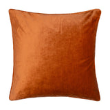 Square velvet cushion in rust orange with a piped edge, shown on a plain white background, Luxe Velvet Plain Polyester Cushion.