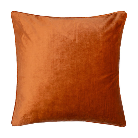 Square velvet cushion in rust orange with a piped edge, shown on a plain white background, Luxe Velvet Plain Polyester Cushion.