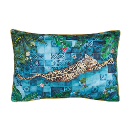 Majorelle rectangular cushion in azure blue, printed with a leopard stretched across Moroccan tile patterns and tropical palm fronds, polyester fabric, shown on a white background.