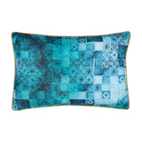 Majorelle reversible rectangular cushion in Azure, showing the tile-pattern reverse side in teal and blue mosaic squares with a mustard piped edge, on a plain white background.