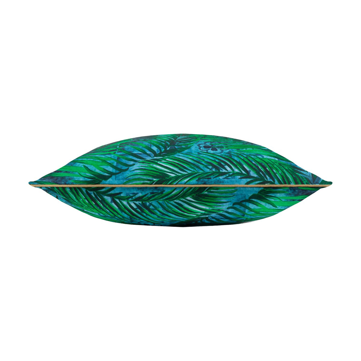 Side view of the Majorelle reversible polyester cushion in Azure showing green palm leaf print, blue tones, and caramel piping along the seam, on a plain white background.