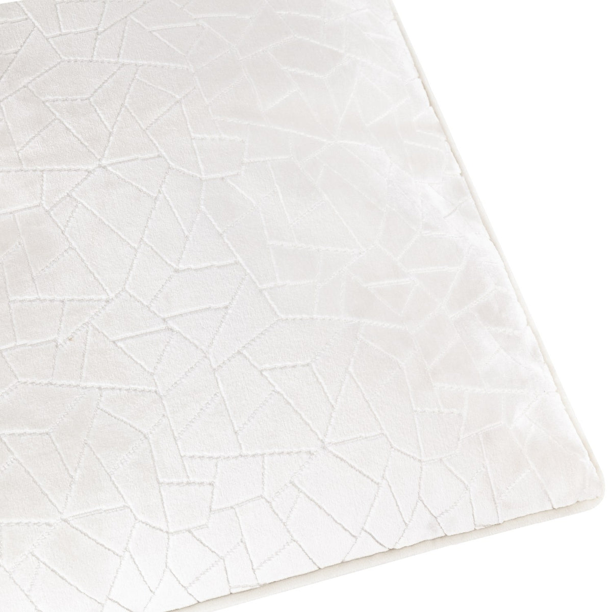 Close-up of the Malans Geometric Velvet Cushion in milk cream, showing cut-velvet fractured, crackled-glass pattern with a piped edge, on a plain white background.