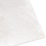 Close-up of the Malans Geometric Velvet Cushion in milk cream, showing cut-velvet fractured, crackled-glass pattern with a piped edge, on a plain white background.