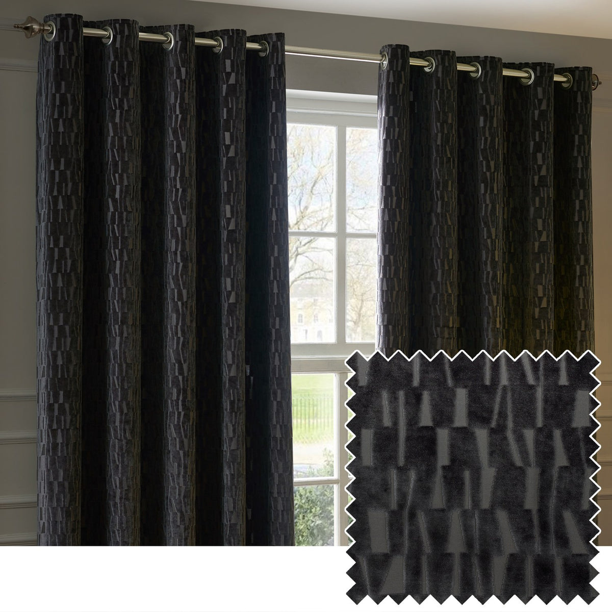 Manhattan Velvet Fully Lined Eyelet Curtains in charcoal, shown hung on a chrome pole in a living room window, with textured geometric cut-pile fabric and a matching swatch inset.