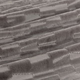 Close-up of Manhattan velvet eyelet curtain fabric in mink brown, showing a cut-velvet textured geometric tile pattern with visible stitched grid lines.