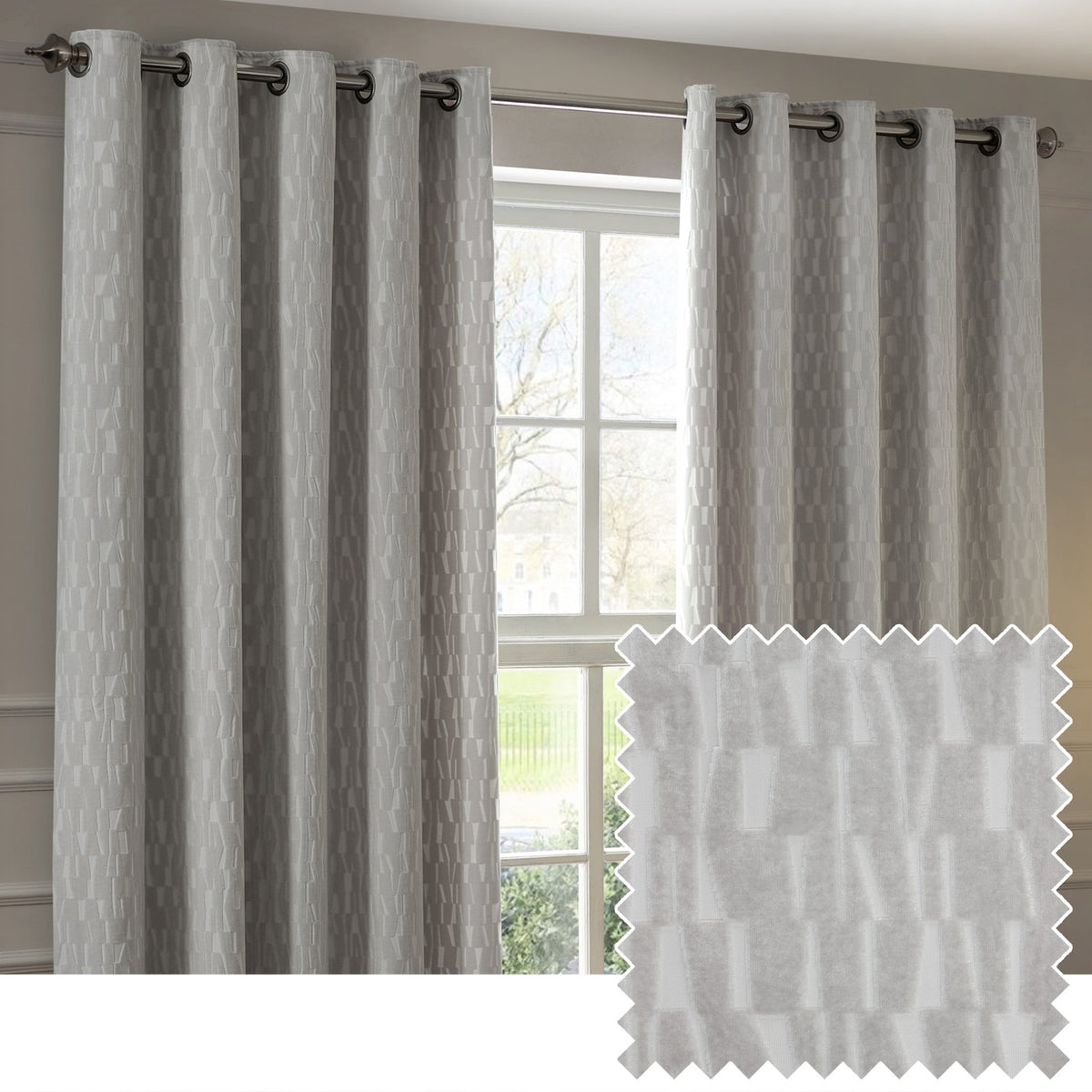 Manhattan Velvet Fully Lined Eyelet Curtains in silver grey, hung on a rod either side of a window, with a fabric swatch showing the raised geometric block pattern.