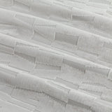 Close-up of Manhattan silver-grey cut velvet eyelet curtain fabric, showing a raised geometric block pattern with a soft pile finish.