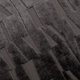 Close-up of the Manhattan Geometric Velvet Cushion in charcoal, showing cut-velvet vertical bars in raised pile against a flatter woven ground.