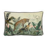 Manyara Animal Velvet Cushion, rectangular, with a printed jungle scene of a leopard among palm fronds and foliage in green and multicolour tones, edged with dark piping, on a white background.