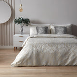 Marble Jacquard Abstract Duvet Cover Set in Oyster on a bed with grey velvet cushions, styled in a neutral bedroom with wooden flooring and a pendant light.