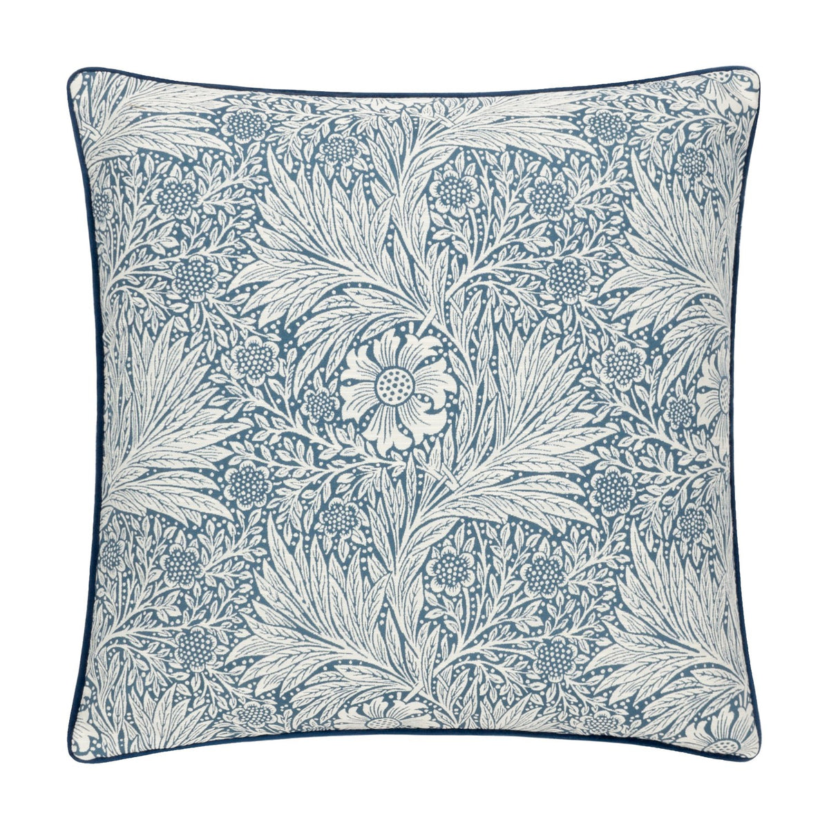 Square cushion in indigo blue jacquard velvet with a cream Marigold floral and foliage pattern by William Morris, finished with matching piped edging, shown on a plain white background.