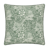 Square jacquard velvet cushion with the Marigold design, showing pale flowers and foliage woven into a deep leaf green ground, finished with matching piped edges on a plain white background.