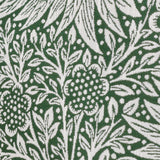 Close-up of the Marigold Jacquard Velvet Cushion in Leaf Green, showing a woven floral and foliage pattern in white against a deep green ground with raised jacquard texture.