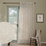 Marigold Damask Linen Curtain Panel in cream hanging beside a glazed door, with a fabric swatch inset showing the foliage and floral pattern in putty tones.