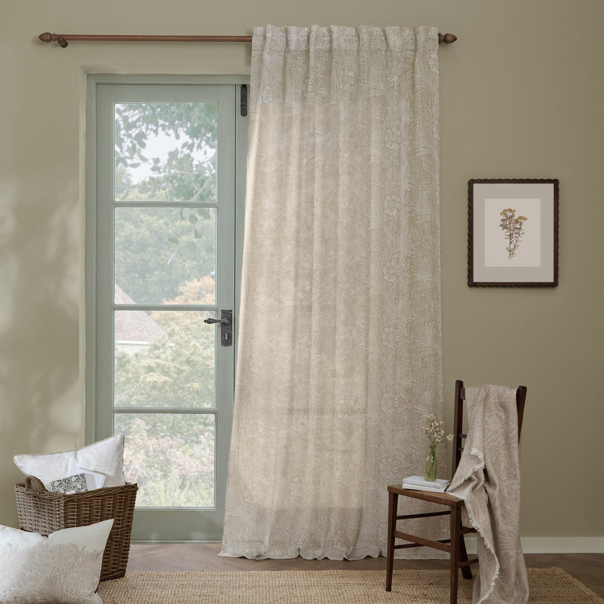 Marigold Damask Linen Curtain Panel in cream, hung by a French door, showing the printed foliage design against a neutral living-room wall.
