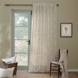 Marigold Damask Linen Curtain Panel in cream, hung by a French door, showing the printed foliage design against a neutral living-room wall.