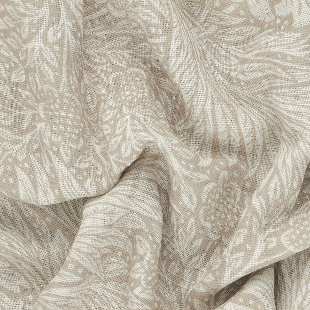 Close-up of the Marigold Damask curtain panel in linen, showing a cream and putty foliage damask print woven into the textured fabric.