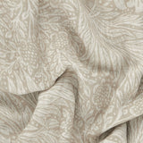 Close-up of the Marigold Damask curtain panel in linen, showing a cream and putty foliage damask print woven into the textured fabric.